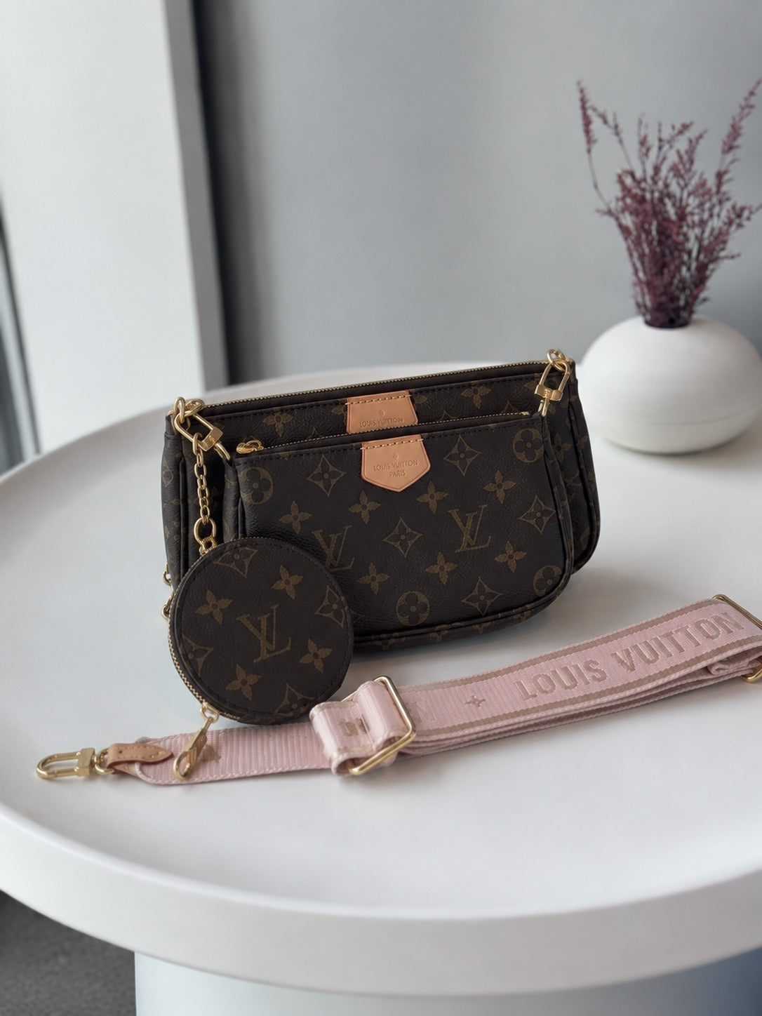 LOUIS VUITTON MUTI POCHETTE