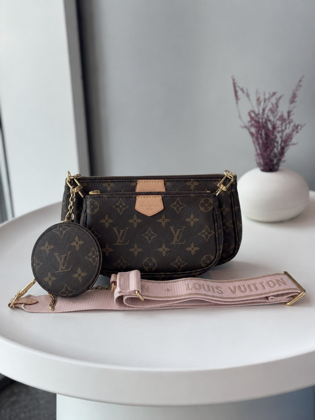 LOUIS VUITTON MUTI POCHETTE