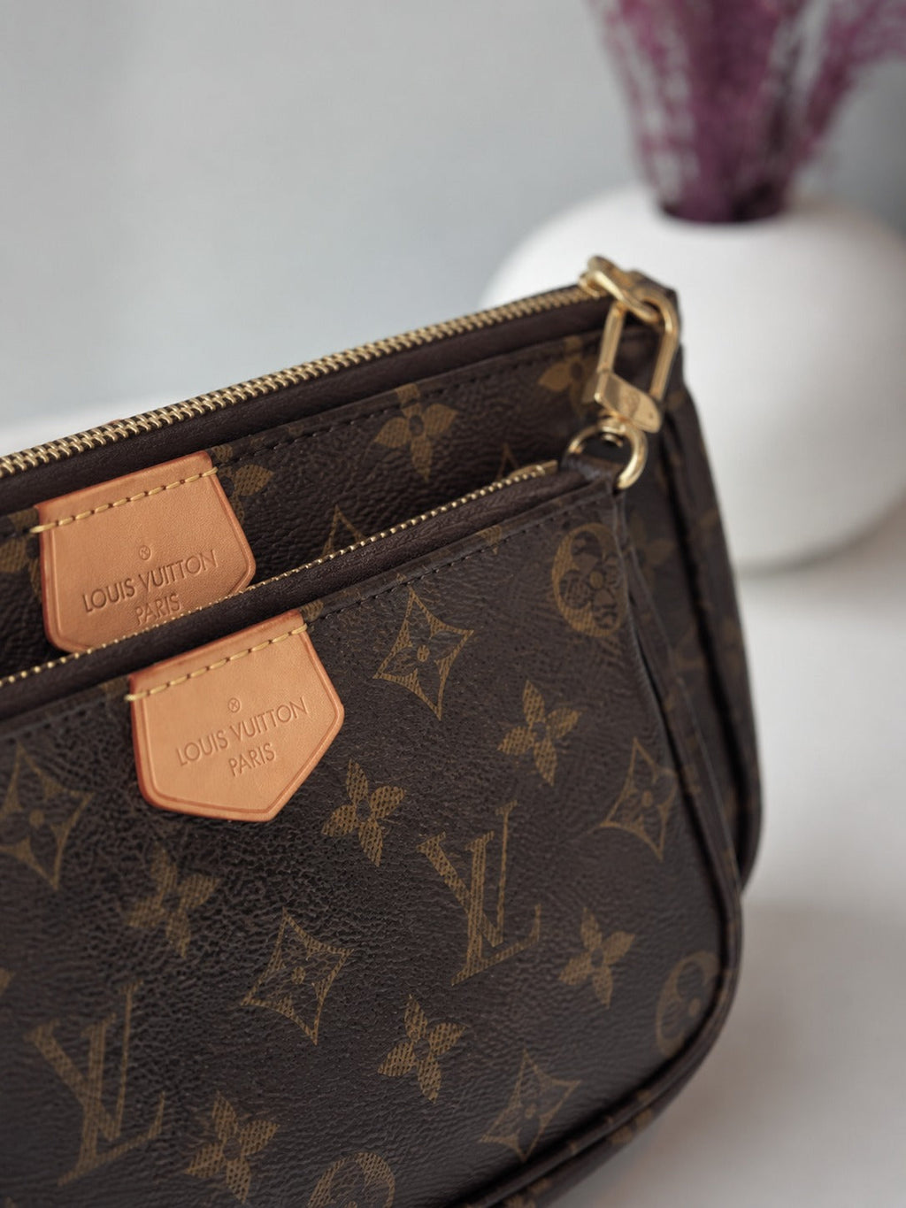 LOUIS VUITTON MUTI POCHETTE