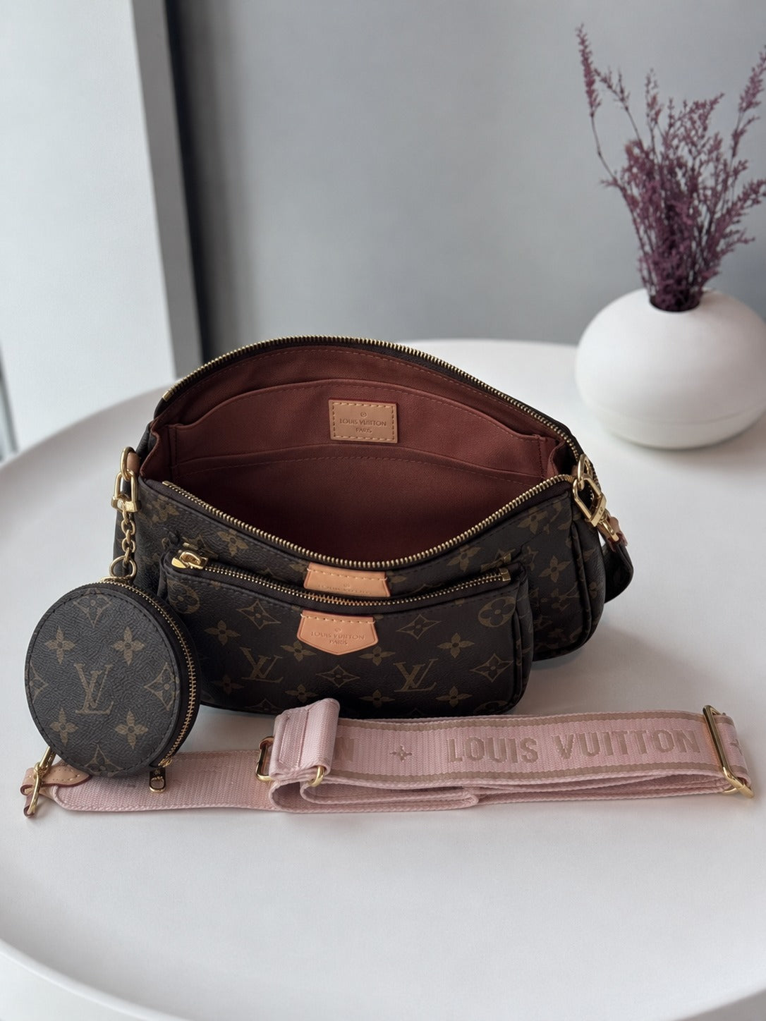 LOUIS VUITTON MUTI POCHETTE
